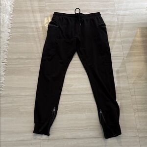 Sleek Black Joggers with Zippered Pockets